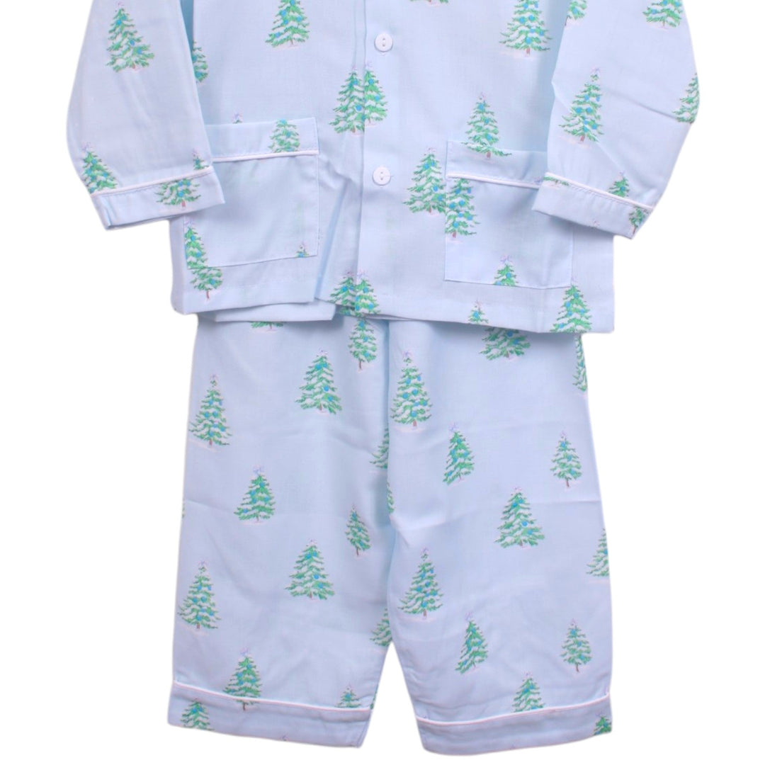 That Store boys pajama set in light blue with a whimsical green Christmas tree print and white piping detail.