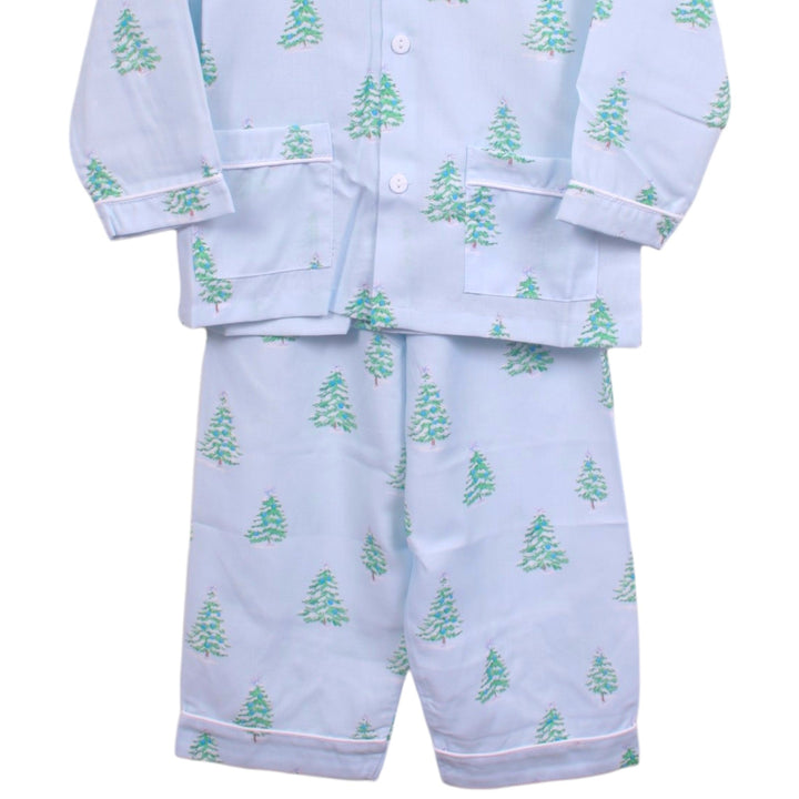 That Store boys pajama set in light blue with a whimsical green Christmas tree print and white piping detail.