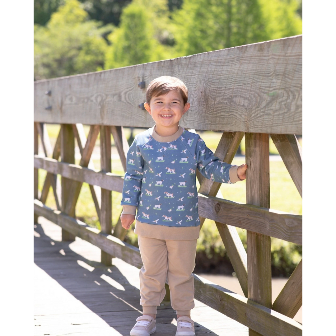 That Store boys green French terry set with hunting dog print, featuring a long-sleeve top and matching joggers.