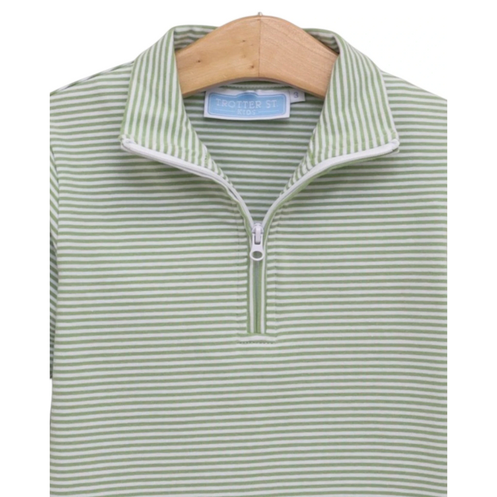 That Store boys green and white striped quarter-zip pullover made from soft cotton blend fabric on a wooden hanger