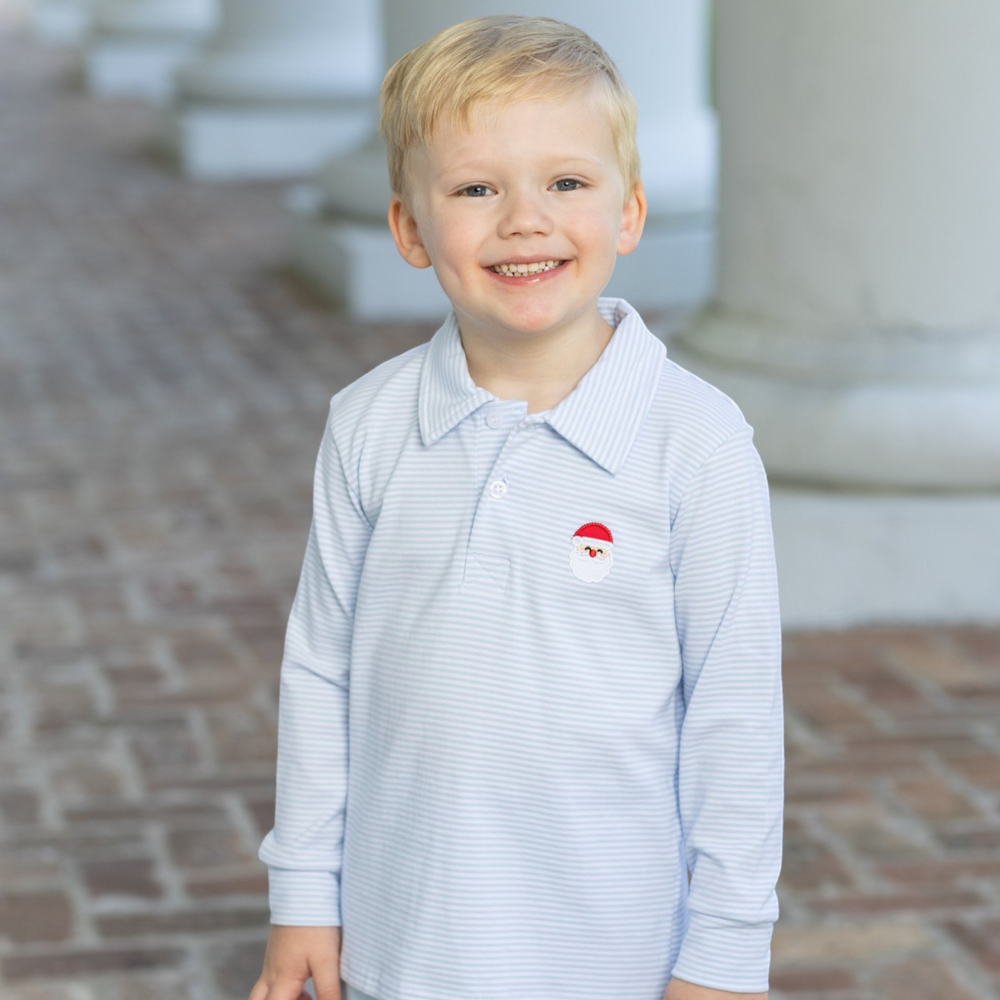 That Store boys long sleeve polo in blue stripe with embroidered Santa detail worn by a smiling young boy