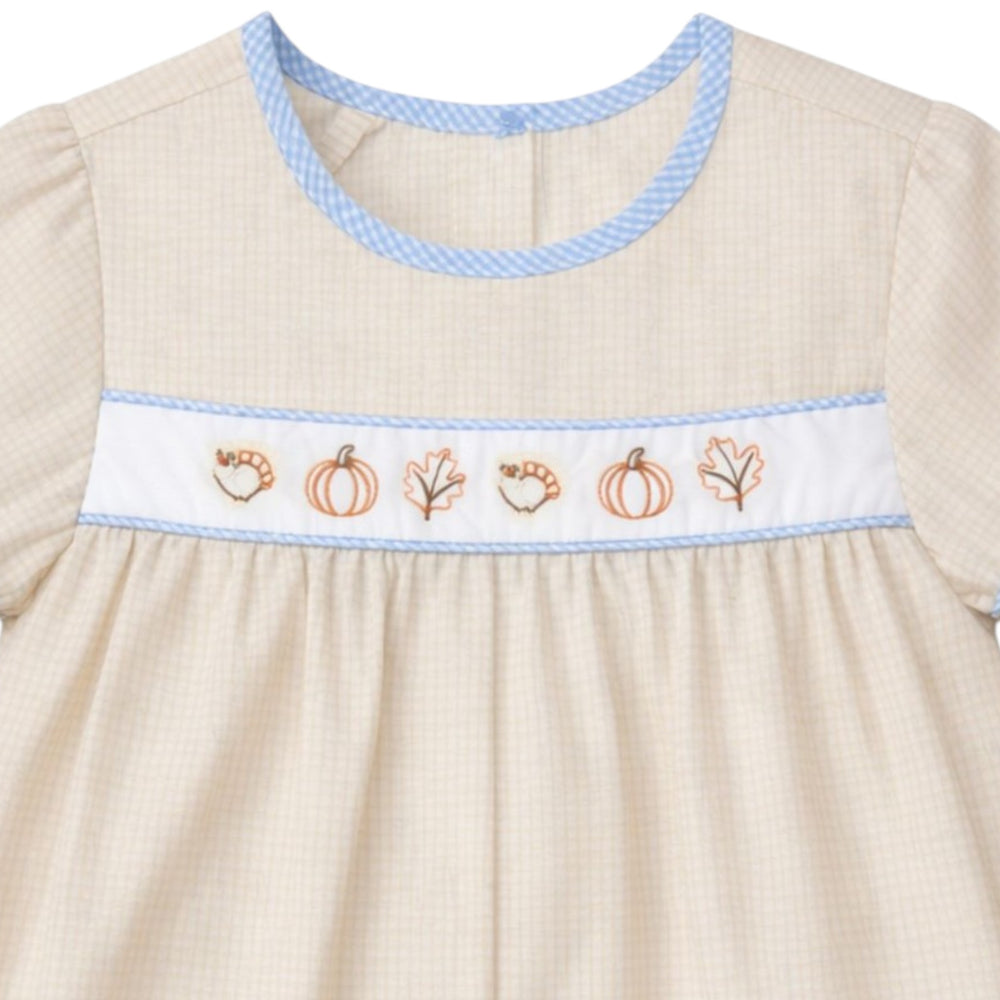 That Store boys brown gingham bubble with embroidered turkeys, pumpkins, and leaves, featuring blue trim details.