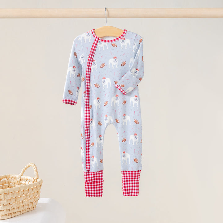 That Store organic cotton kids zip-up pajamas featuring a light blue bulldog and football print with red gingham trim