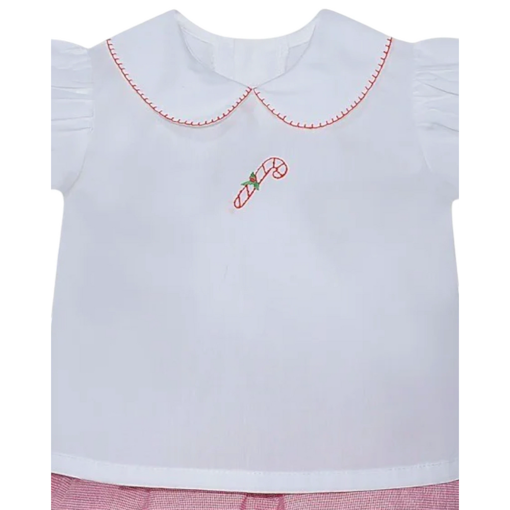 That Store girls holiday diaper set with white puff sleeve top, red candy cane embroidery, and red check bloomers.