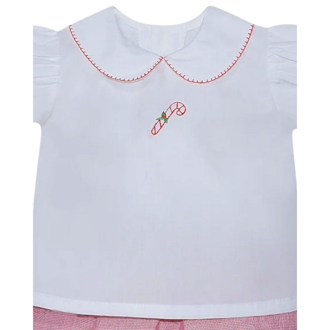 That Store girls holiday diaper set with white puff sleeve top, red candy cane embroidery, and red check bloomers.