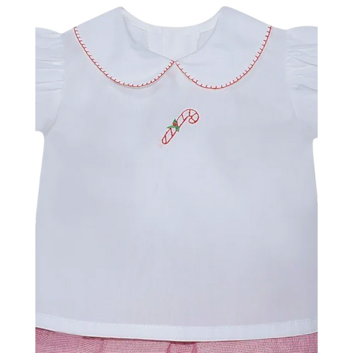 That Store girls holiday diaper set with white puff sleeve top, red candy cane embroidery, and red check bloomers.