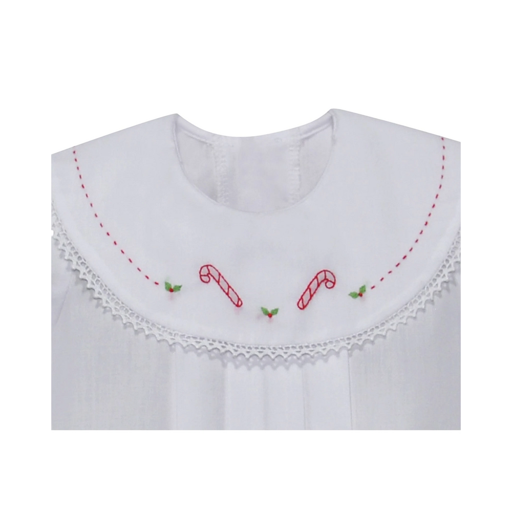 That Store white holiday dress with embroidered candy canes and holly on a lace-trimmed round collar