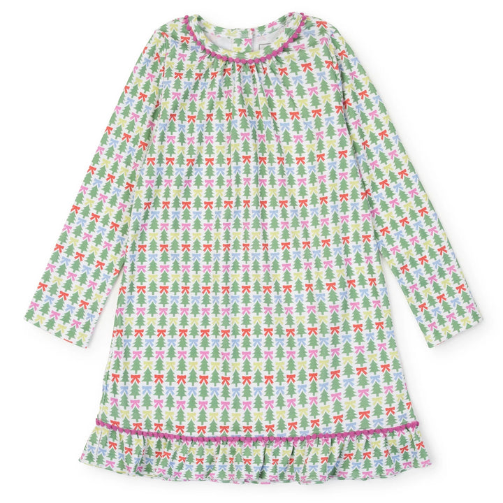 That Store Carlin doll dress in white Pima cotton with green Christmas tree and colorful bow print and pom-pom trim.