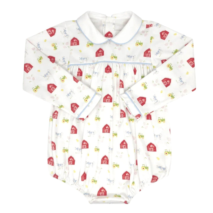 That Store Covington bubble in white knit with a barnyard tales print, long sleeves, and light blue piping detail.