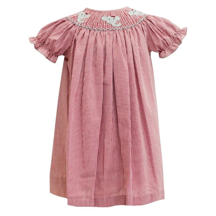 That Store crimson gingham bishop smock dress for girls featuring embroidered elephant details and puff sleeves.