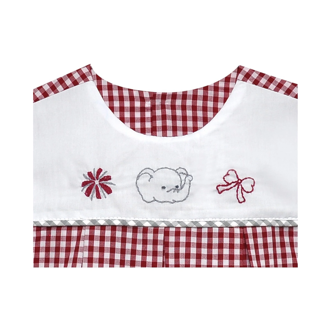 That Store crimson and white gingham girls dress featuring embroidered elephant, pom pom, and bow detail on bodice