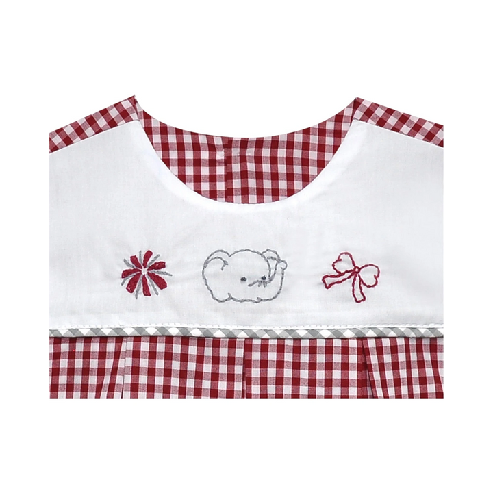 That Store crimson and white gingham girls dress featuring embroidered elephant, pom pom, and bow detail on bodice