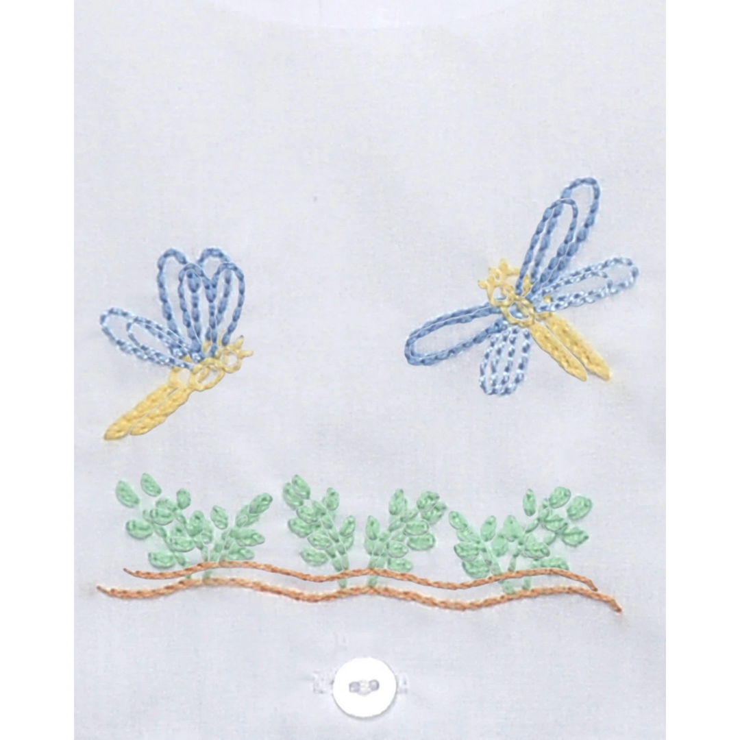 That Store blue bubble romper featuring embroidered yellow and blue dragonflies and green foliage on white fabric