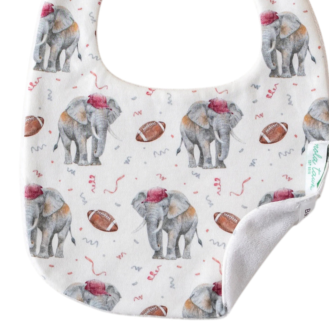 That Store organic cotton baby bib featuring a cute elephant and football print with an absorbent terrycloth back