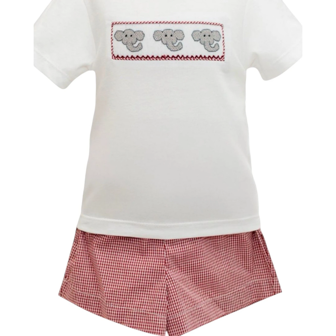 That Store boys smock short set featuring a white shirt with grey elephant embroidery and red gingham shorts.