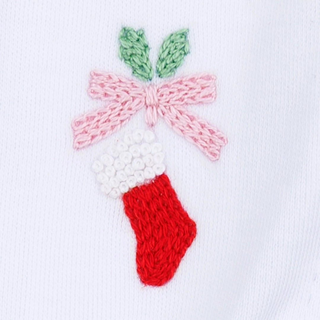 That Store hand-embroidered Christmas stocking and pink ribbon detail on white cotton fabric