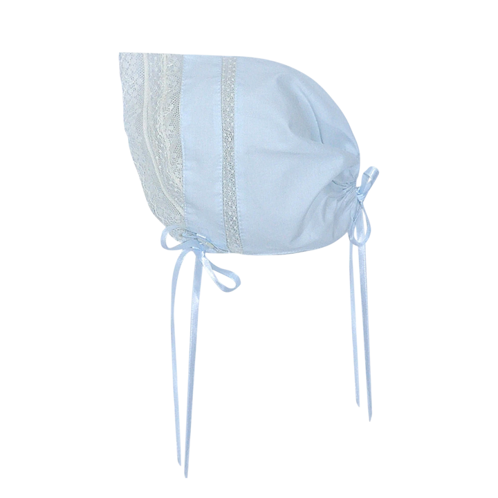 That Store Finn baby bonnet in light blue cotton with delicate ecru lace trim and matching ribbon ties.