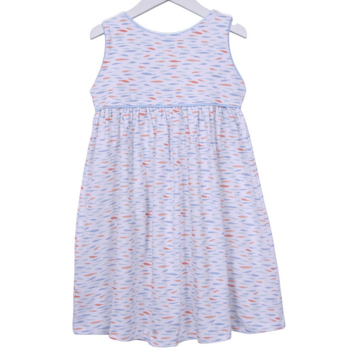 That Store girls dress in white Pima cotton with blue and orange fish print, blue piping, and back button closure.