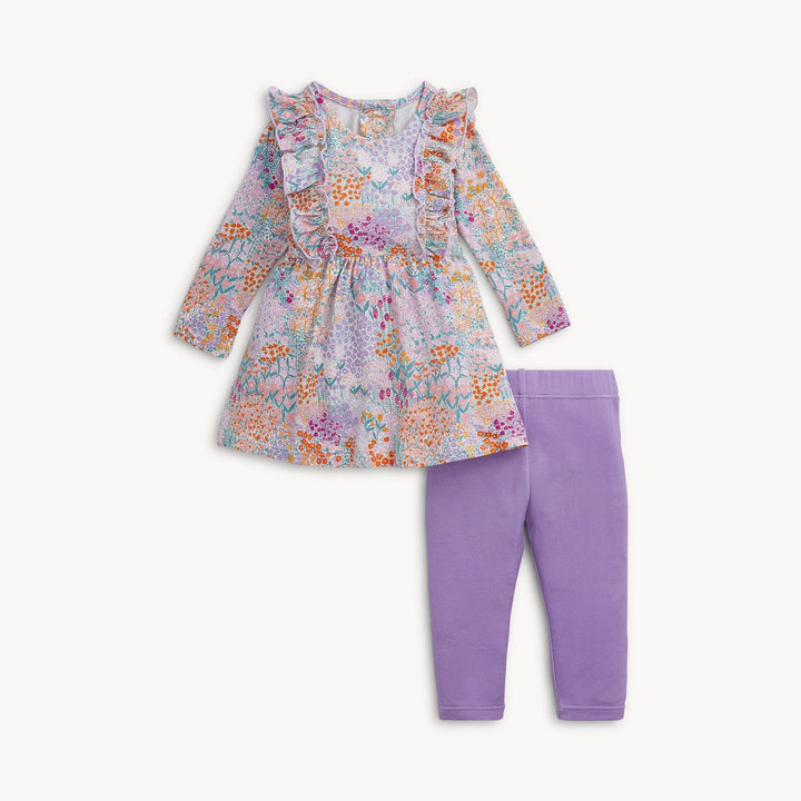 That Store Arabella floral print modal dress with ruffle shoulders and matching purple leggings with magnetic closures.