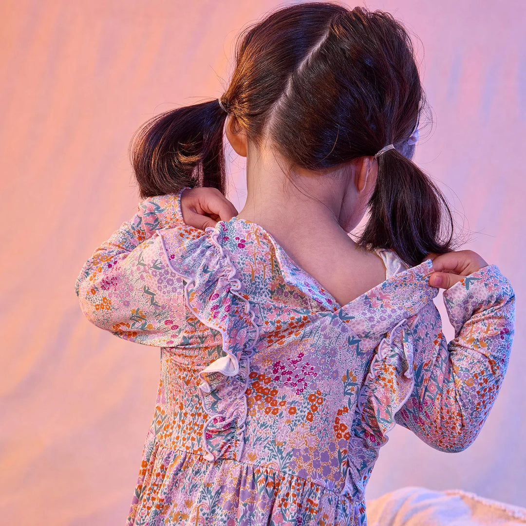 That Store Arabella floral print modal dress with magnetic back closure and ruffle details on a young girl