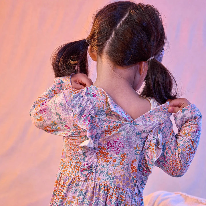 That Store Arabella floral print modal dress with magnetic back closure and ruffle details on a young girl