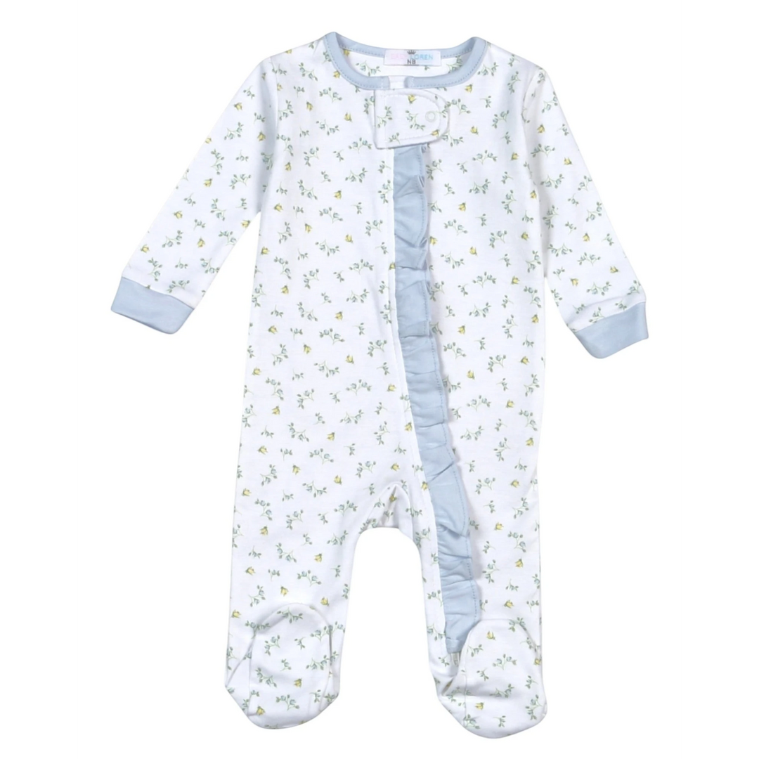 That Store baby girl footie in white pima cotton with blue and yellow floral print, blue ruffles, and front zipper.