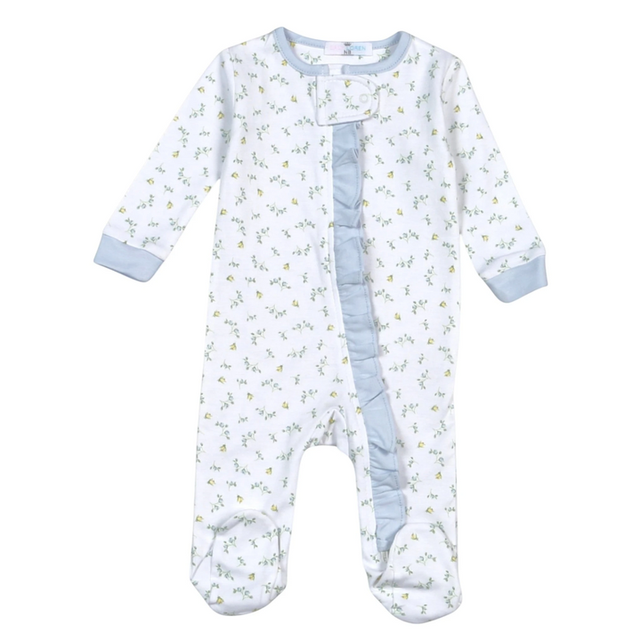 That Store baby girl footie in white pima cotton with blue and yellow floral print, blue ruffles, and front zipper.