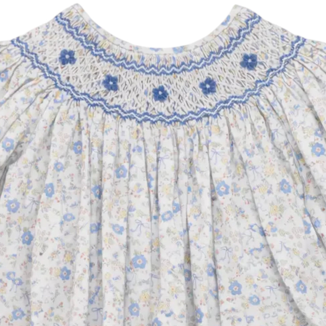 That Store girls smocked bubble in blue and yellow bow floral print with detailed blue chest smocking, 100% cotton.