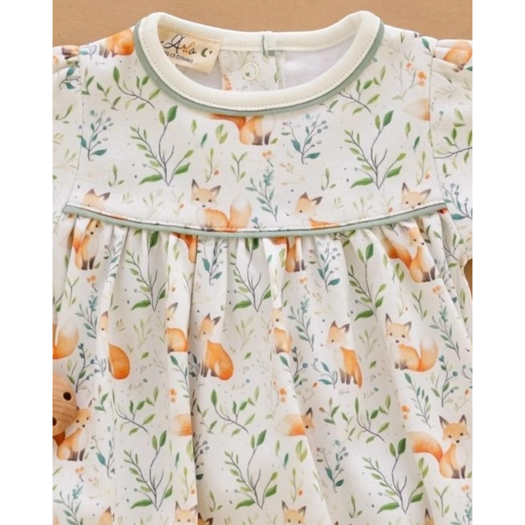 That Store Fox Tales long sleeve baby bubble in soft Pima cotton with a whimsical woodland fox and leaf print.