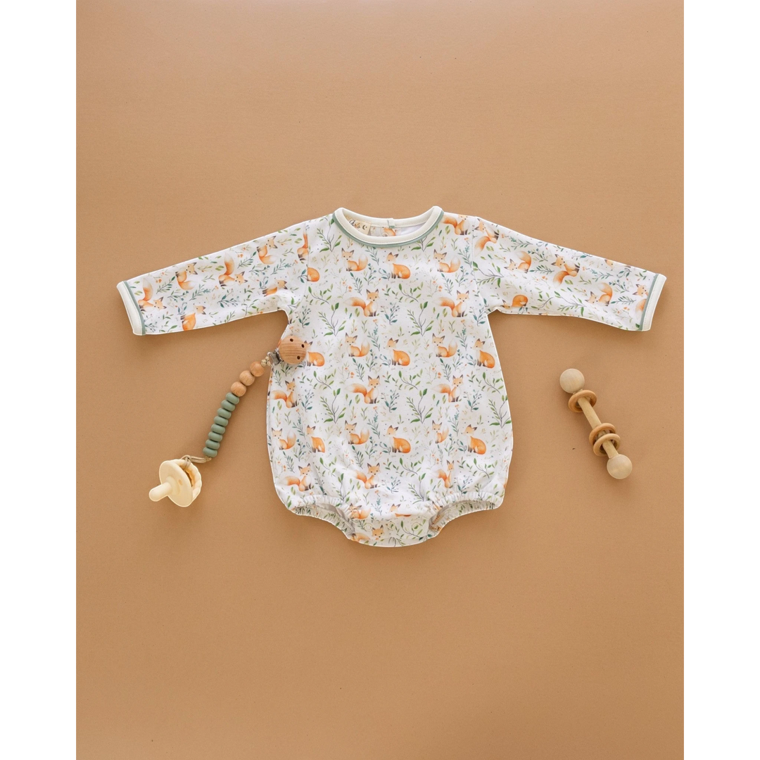 That Store Fox Tales long sleeve baby bubble in soft Pima cotton with a woodland fox print and snap closures.