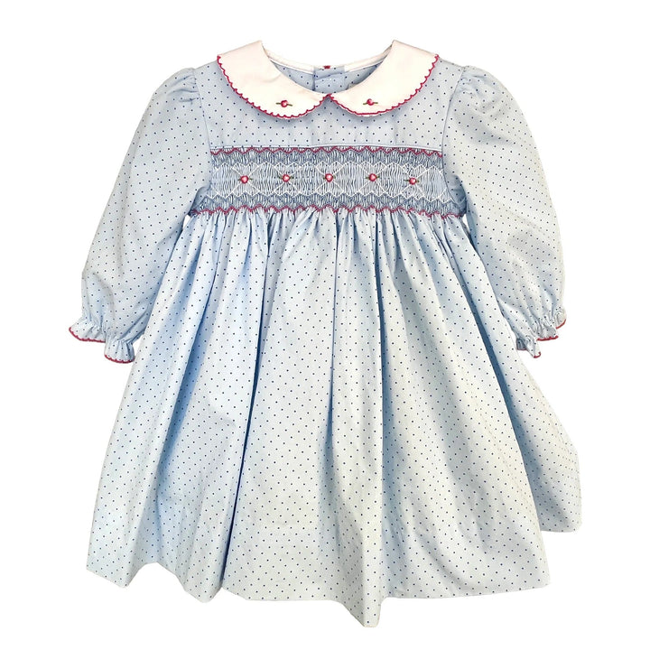 That Store girls blue cotton dress with dot print, hot pink smocking, flower embroidery, and white peter pan collar.