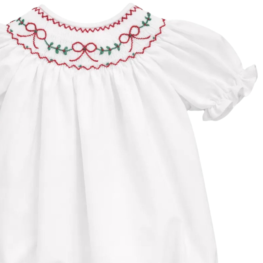 That Store white cotton girls bubble with red bow and green holly embroidery on a scalloped collar for Christmas