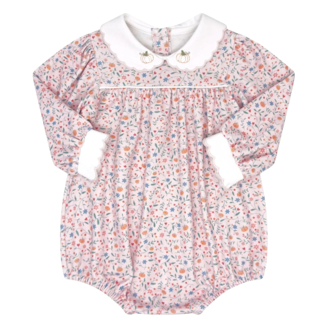 That Store girls long sleeve bubble romper in pink Pumpkin Grove floral print with pumpkin embroidery on the collar.