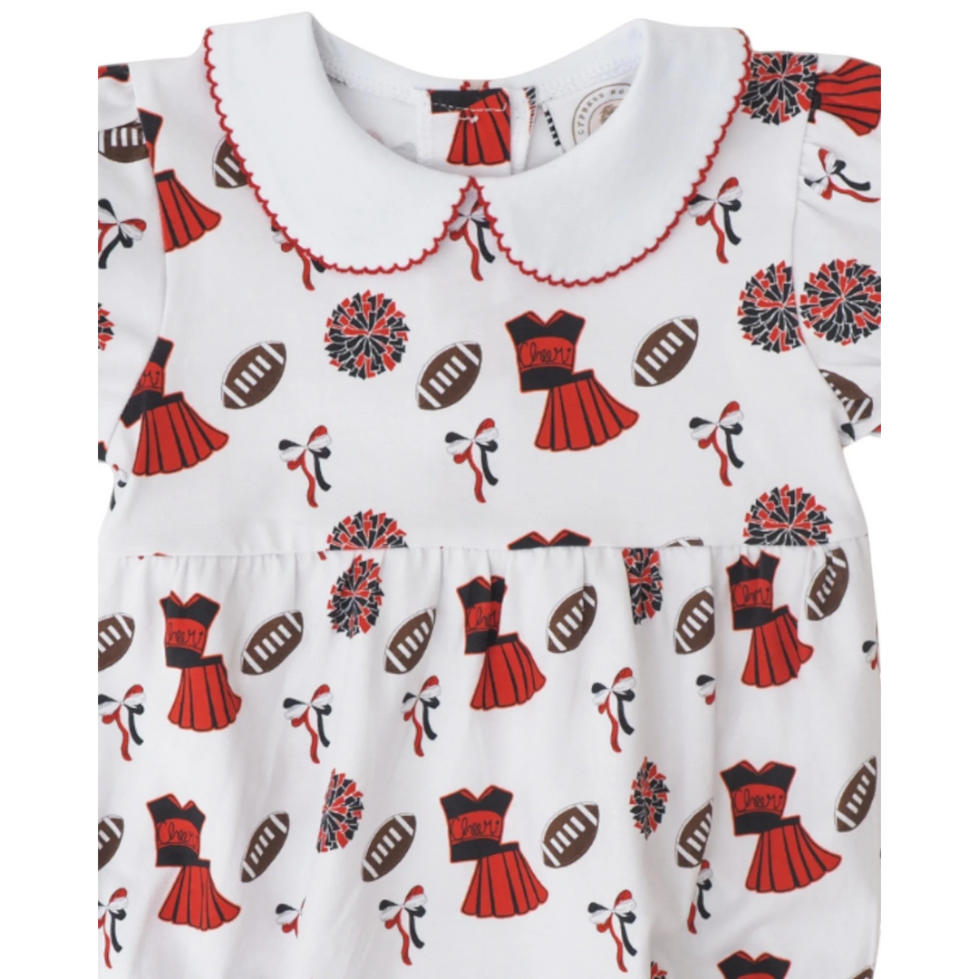 That Store girls bubble featuring a white fabric with red and black football, cheerleader, and pom-pom print