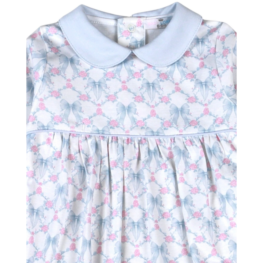 That Store girls romper in soft Pima cotton featuring a blue bow and pink rose trellis print with a peter pan collar.