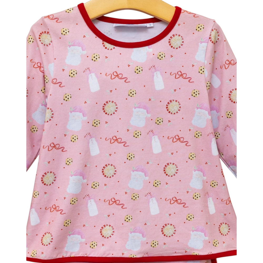 That Store girls pink Christmas lounge set featuring a playful Santa, milk, and cookie print on soft cotton fabric.