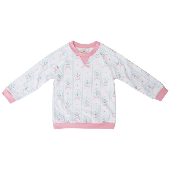 That Store girls pink pullover with white and blue floral cameo print, featuring long sleeves and ribbed trim.