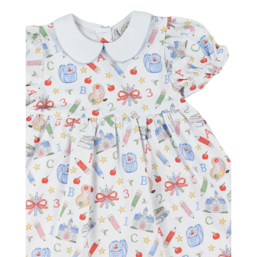 That Store girls red and multi-colored school supplies print dress with a classic Peter Pan collar