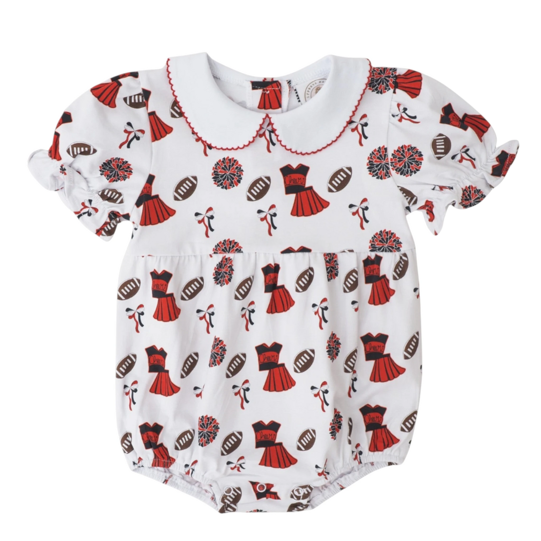 That Store girls bubble romper in white with red and black varsity cheerleading, football, and pom-pom print