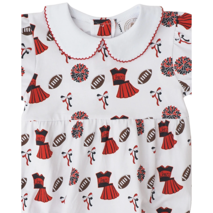 That Store girls bubble featuring a white fabric with red and black cheerleader, football, and pom-pom print.