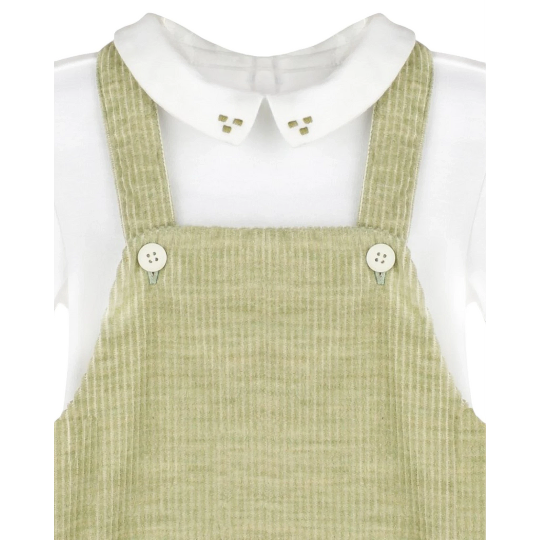 That Store green corduroy longall with a white knit Peter Pan collar featuring delicate green embroidery details.