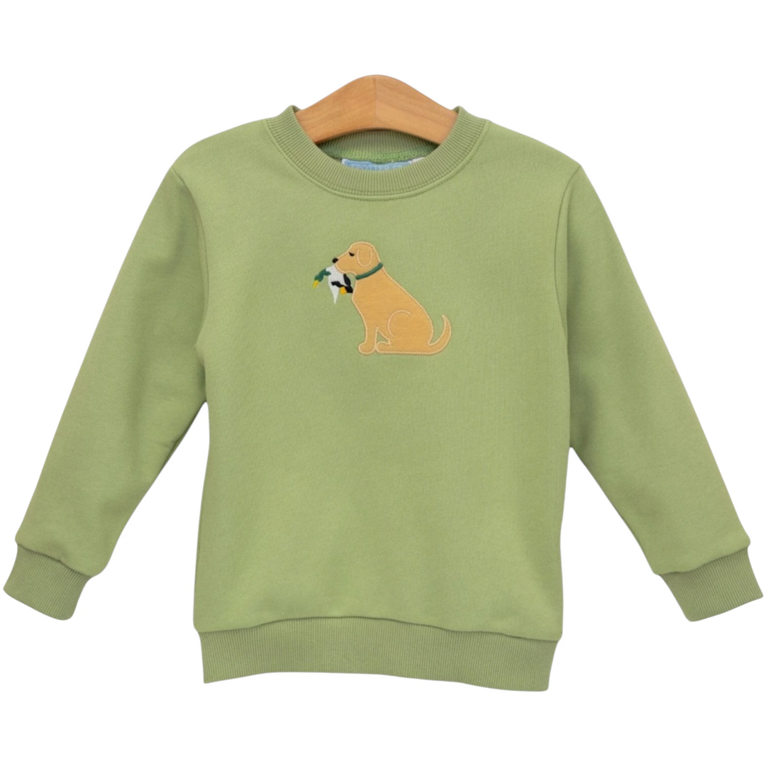 That Store green French terry boys pullover featuring an embroidered golden retriever dog design on a wooden hanger.