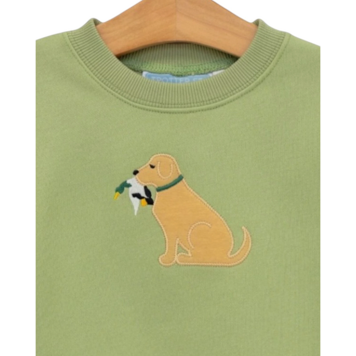 That Store green French terry boys pullover featuring a cute embroidered yellow dog holding a duck