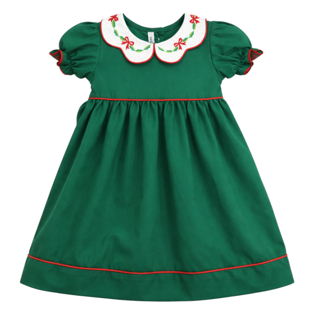 That Store girls green cotton dress featuring a white scallop collar with red bow and holly embroidery for Christmas.