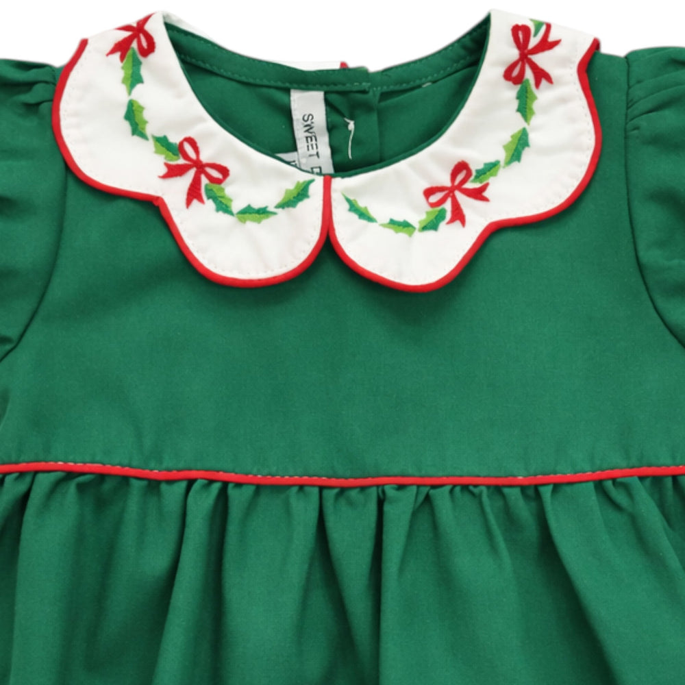 That Store girls green cotton bubble featuring a white scallop collar with red bow and holly embroidery