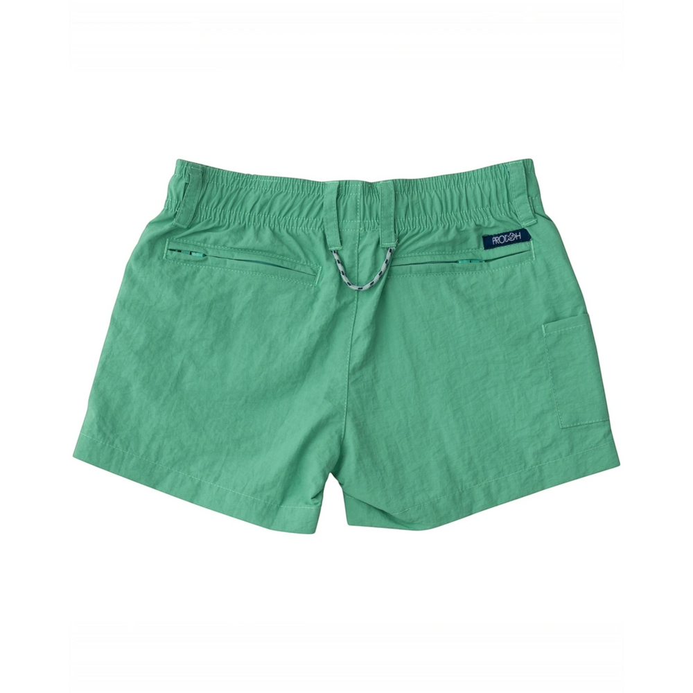 That Store green spruce boys performance shorts with elastic waistband, zippered back pockets, and signature loop.