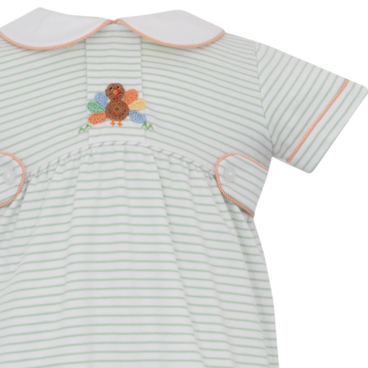 That Store boys green stripe knit bubble romper with a crochet turkey appliqué and white collar for Thanksgiving.