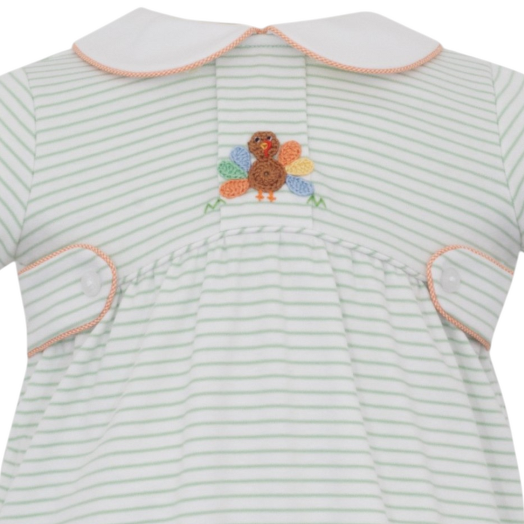 That Store boys green stripe knit bubble romper featuring a detailed crochet turkey appliqué and white collar.