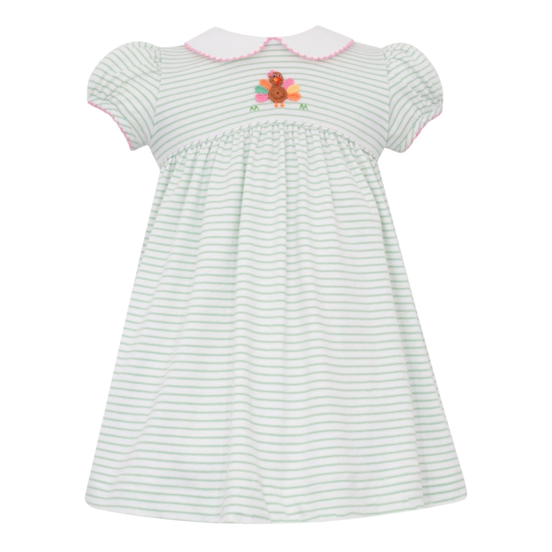 That Store girls knit dress in green stripes featuring a crochet turkey appliqué and a white peter pan collar.