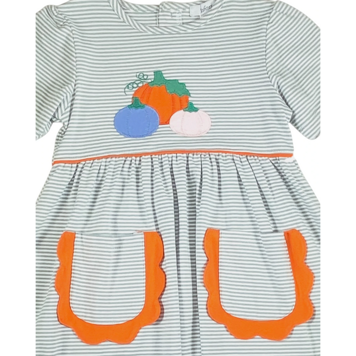 That Store green striped dress for girls featuring a pumpkin applique and orange scalloped pockets for fall.